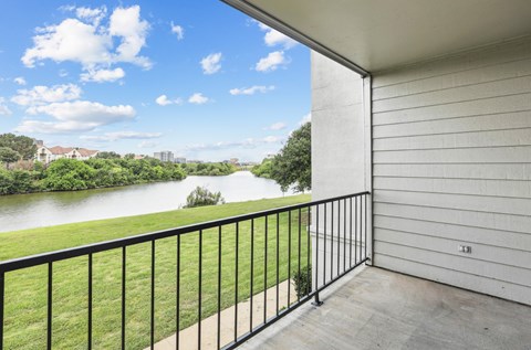 B1 floor plan balcony overlooking Hackberry Creek at Jefferson Creek Apartments in Irving, TX.